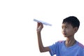 Asian boy holding play fold paper airplane on white background.