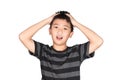 Asian boy kid holding his head frowning with screaming. pulling Royalty Free Stock Photo