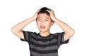 Asian boy kid holding his head frowning with screaming. pulling Royalty Free Stock Photo