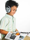 Asian boy listening to music Royalty Free Stock Photo
