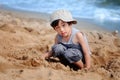 Asian boy playing on the beach Royalty Free Stock Photo