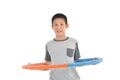Asian boy playing with the hulahoop on a white Royalty Free Stock Photo