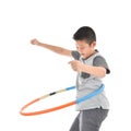 Asian boy playing with the hulahoop on a white Royalty Free Stock Photo