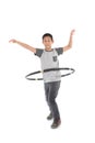 Asian boy playing with the hulahoop on a white Royalty Free Stock Photo