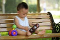 Asian boy playing toy Royalty Free Stock Photo