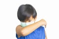 Asian boy sickness in medical mask,coughs his elbow and sneeze into arm,isolated white background,concept pandemic epidemic Royalty Free Stock Photo