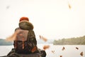 Asian boy sitting on park winter season Royalty Free Stock Photo