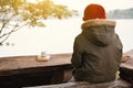 Asian boy sitting on park winter season Royalty Free Stock Photo