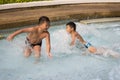 Asian boy smile in swimming pool Royalty Free Stock Photo