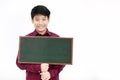 Asian boy smiling and hand holding blank board. Royalty Free Stock Photo