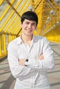 Asian boy stand on footbridge Royalty Free Stock Photo