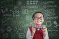 Asian boy student hold learn block in class Royalty Free Stock Photo