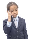 Asian boy in suit talking on mobile phone over white Royalty Free Stock Photo