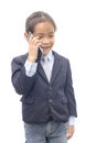 Asian boy in suit talking on mobile phone over white Royalty Free Stock Photo