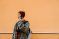 Asian boy talking on mobile phone while standing outdoors Royalty Free Stock Photo