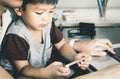 Asian boy is using Phone Royalty Free Stock Photo