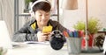 Asian boy watching on cell phone with smile face . Royalty Free Stock Photo