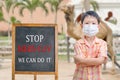 Asian boy wearing mask with text Royalty Free Stock Photo