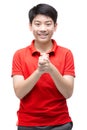 Asian boy wearing a red shirt Pretending to think of something that he can`t think of On a white background