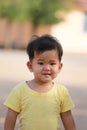 Asian boy in yellow dress and he smiled are happy. Royalty Free Stock Photo