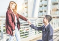 Asian boyfriend holding girlfriend hand for wedding proposal - Man asking to his woman to marry - Marriage, love and relationship