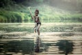 Asian boys fishing at the river