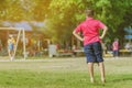 Asian boys practice kicking the ball to score goals