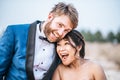 Asian bride and Caucasian groom have romance time and happy