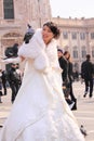 Asian bride with pigeon in milan