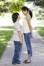 Asian Brother and Sister in Park Royalty Free Stock Photo