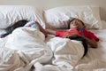 Asian brother and sister sleeping on the bed. Royalty Free Stock Photo