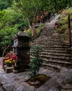 Asian Buddhist Temple Shrine with stairs leading up to temple at Yen Tu Mountain Royalty Free Stock Photo