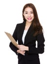 Asian business executive with file pad Royalty Free Stock Photo