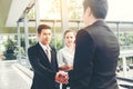 Asian Business Handshake at city outside office Success concept