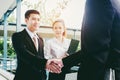 Asian Business Handshake at city outside office Success concept