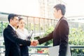 Asian Business Handshake at city outside office Success concept