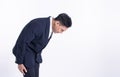 Asian business man bowing on white background Royalty Free Stock Photo