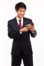 Asian business man with cellphone. Royalty Free Stock Photo