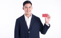 Asian business man holding credit card on white background Royalty Free Stock Photo