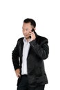 Asian business man in a suit talking on the mobile phone isolate Royalty Free Stock Photo