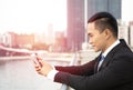 asian business man using smart phone Royalty Free Stock Photo