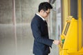 Asian business man withdraw the money at ATM, business finance money concept Royalty Free Stock Photo