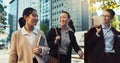 Asian, business people in city and travel, talking and walking with commute to work, conversation and bonding. Journey Royalty Free Stock Photo