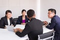 Asian business people in room meeting,Team group discussing together in conference at office Royalty Free Stock Photo