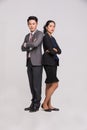 Asian business people stand back to back together Royalty Free Stock Photo