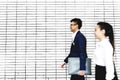 Asian business people walking together Royalty Free Stock Photo