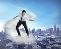 Asian business person flying with the cloud Royalty Free Stock Photo