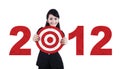 Asian business woman with 2012 business target Royalty Free Stock Photo