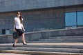 Business Woman with Attache Case Walking in City Royalty Free Stock Photo