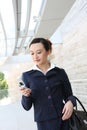 Asian Business Woman on Cell Phone Royalty Free Stock Photo